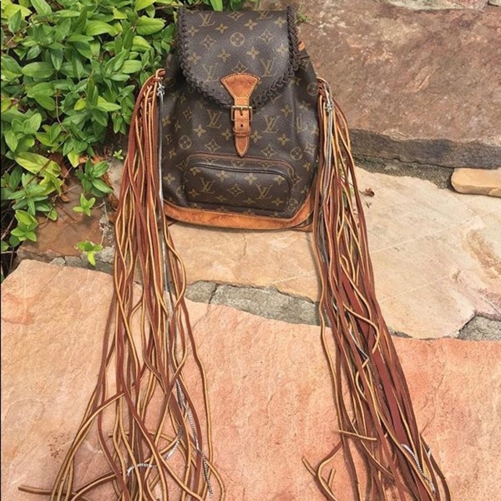 Finged Louis Vuitton Montsauris backpack